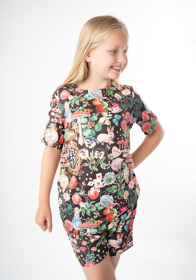 Young girl wearing a floral pyjamas with animal prints